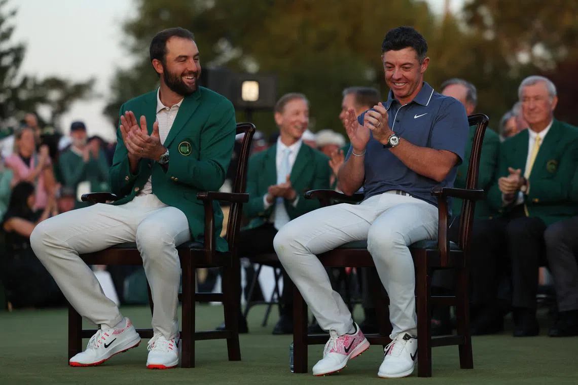 FILE PHOTO: Golf - The Masters - Augusta National Golf Club, Augusta, Georgia, U.S. - April 13, 2025 Northern Ireland's Rory McIlroy before being presented with the green jacket by Scottie Scheffler of the U.S. after winning The Masters and completing a career grand slam REUTERS/Pilar Olivares/File Photo