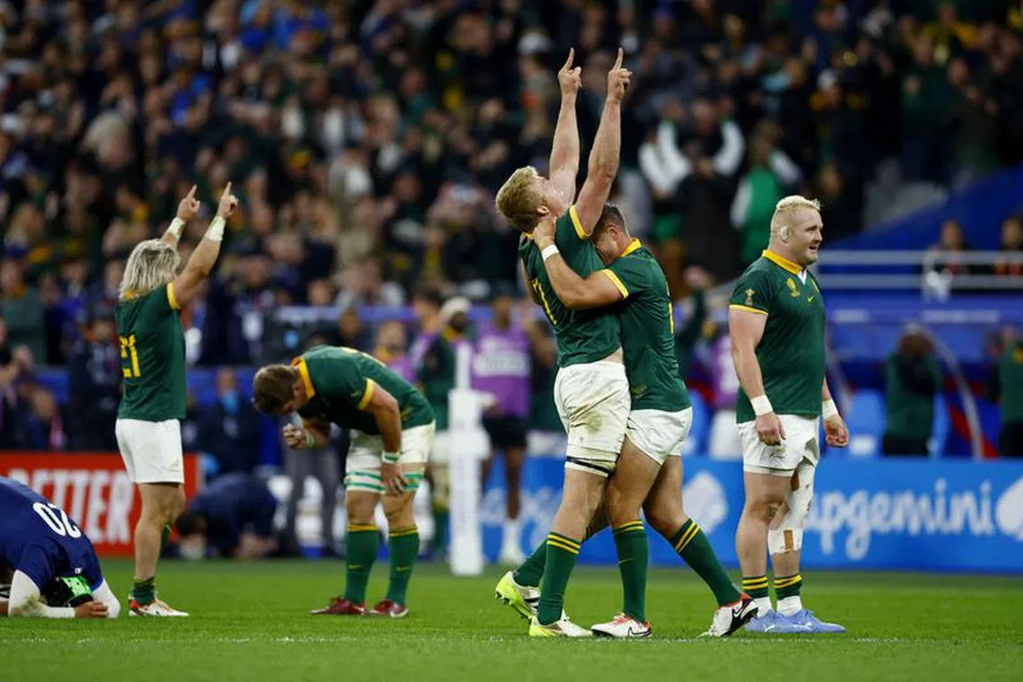 Rugby Union - Rugby World Cup 2023 - Quarter Final - France v South Africa - Stade de France, Saint-Denis, France - October 15, 2023 South Africa's Pieter-Steph du Toit celebrates with Handre Pollard after the match REUTERS/Sarah Meyssonnier