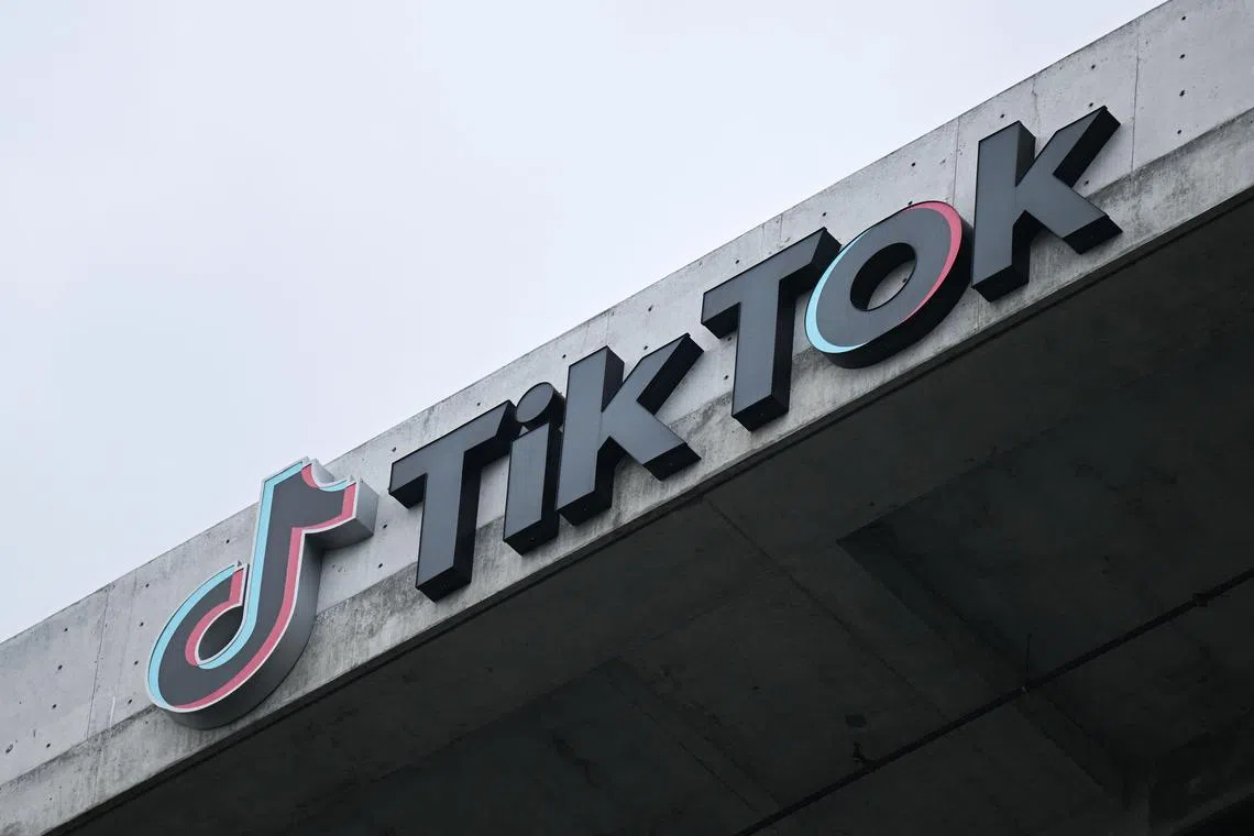 A file photo taken on March 16, 2023 shows the TikTok logo displayed on signage outside TikTok's social media app company office in Culver City, California. 