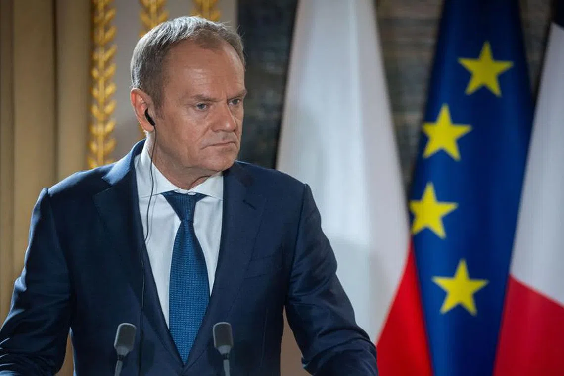 Polish Prime Minister Donald Tusk attends a joint statement to the media with French President Macron (not pictured) as part of their meeting at Elysee Palace, Paris, France, 12 February 2024. Christophe Petit Tesson/Pool via REUTERS