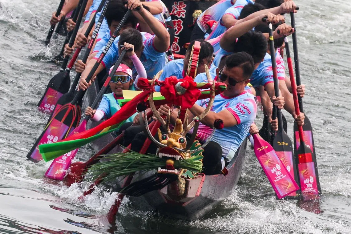 Participants rowing a traditional boat during Dragon Boat Festival celebrations in Beijing, China, on June 19, 2026. 