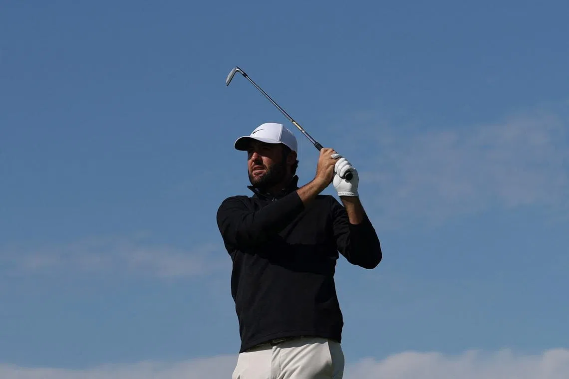 Golf - The 153rd Open Championship - Royal Portrush Golf Club, Portrush, Northern Ireland, Britain - July 19, 2025 Scottie Scheffler of the U.S. hits his tee shot on the 6th hole during the third round REUTERS/Paul Childs