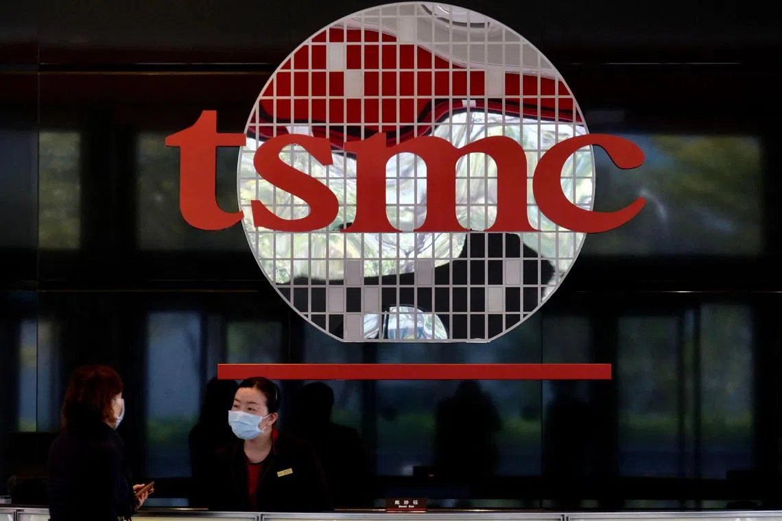 (FILES) Employees work at the headquarters of the world's largest semiconductor maker TSMC in Hsinchu on January 29, 2021. Taiwanese chip giant TSMC said on July 18, 2024, net profit jumped 36 percent in the second quarter of 2024, buoyed by global demand for generative artificial intelligence products. (Photo by Sam Yeh / AFP)