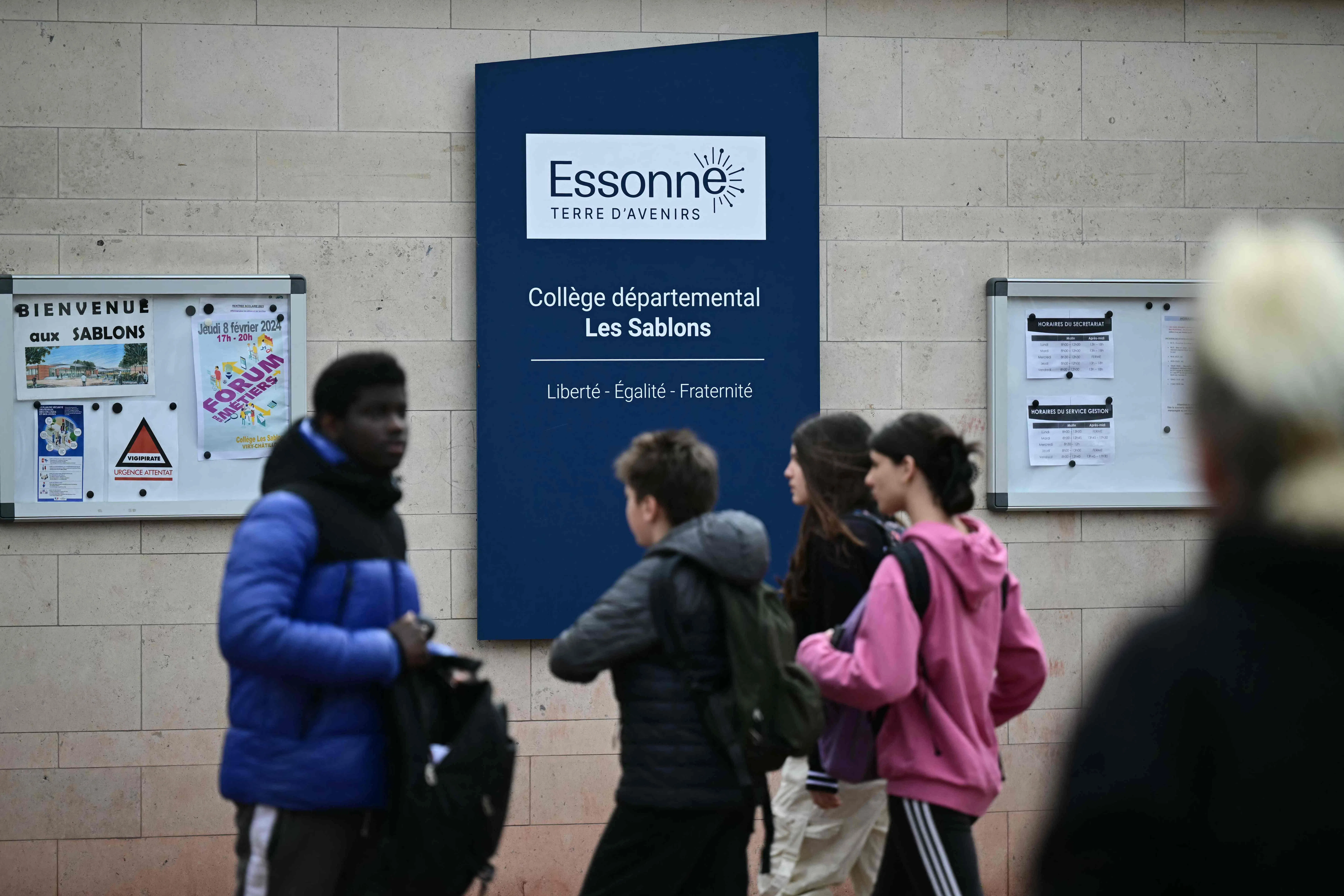 Students at the entrance of Les Sablons school in Viry-Chatillon on April 5, 2024.