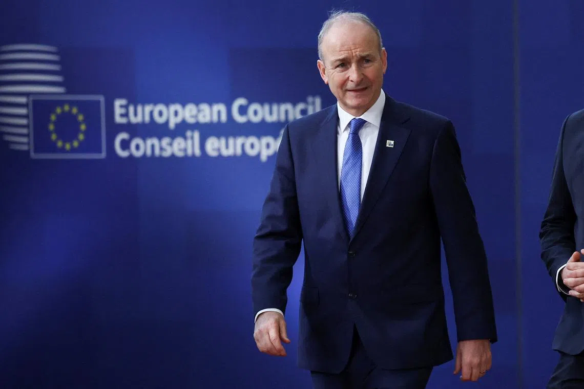 Ireland Prime Minister Micheal Martin arrives at a European Union leaders' summit in Brussels, Belgium, December 18, 2025. REUTERS/Yves Herman
