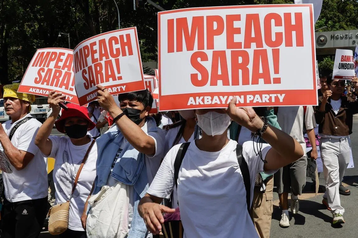 Protesters during a rally calling for the impeachment of Philippine Vice-President Sara Duterte in Quezon City, Metro Manila, on May 11.
