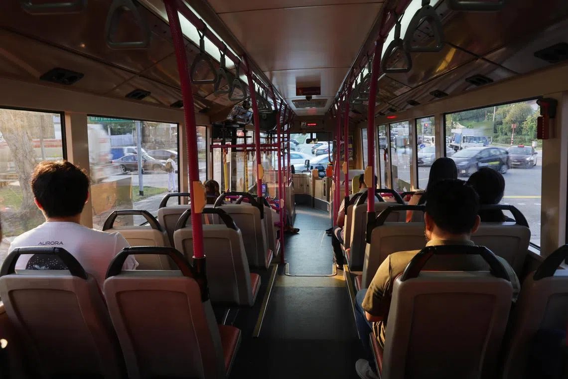 Commuters onboard a SBS transit bus on Oct 13, 2023.
