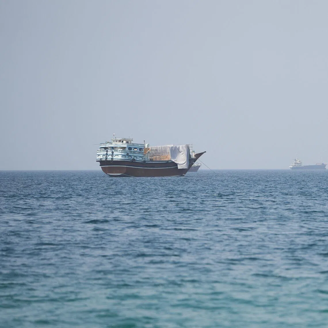 Vessels near the Strait of Hormuz, as seen from Musandam, Oman, on Aug 6.