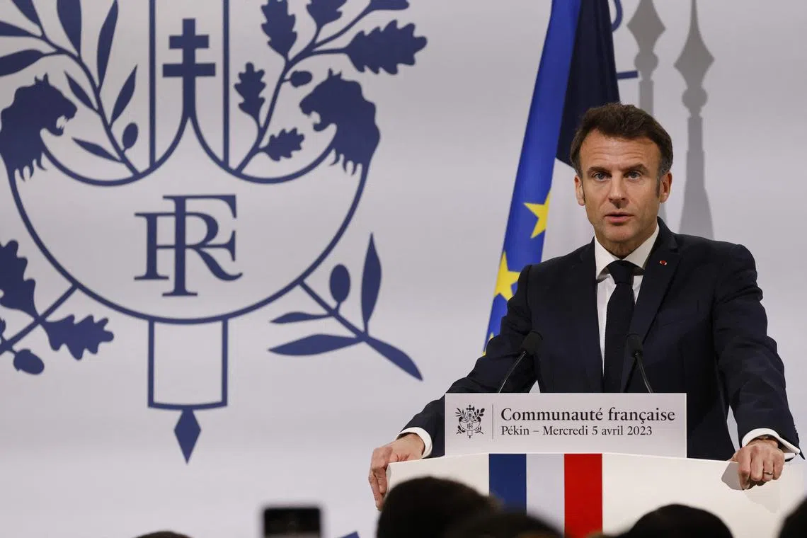 French President Emmanuel Macron speaks during a meeting with China's French community in Beijing.