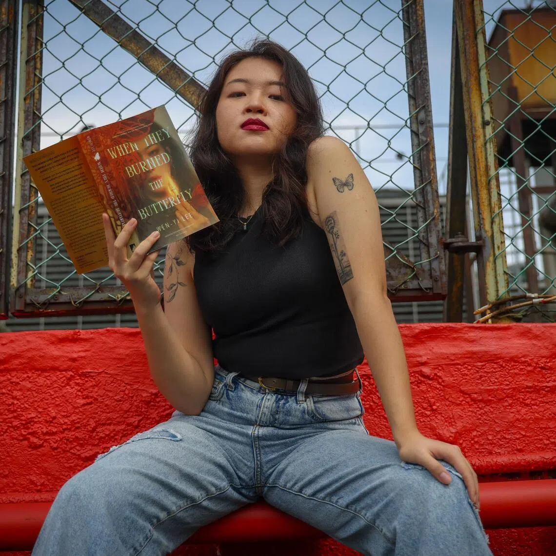 ST20250925_202583600843/shburns19/Shawn Hoo/Jason Quah

Wen-Yi Lee, author of When They Burned the Butterfly, a 2025 historical fantasy novel set in postcolonial Singapore in 1972, pictured Sep 25, 2025. ST PHOTO: JASON QUAH