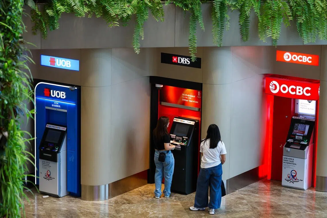 Too expensive? Analysts say Singapore banks’ shares can climb higher