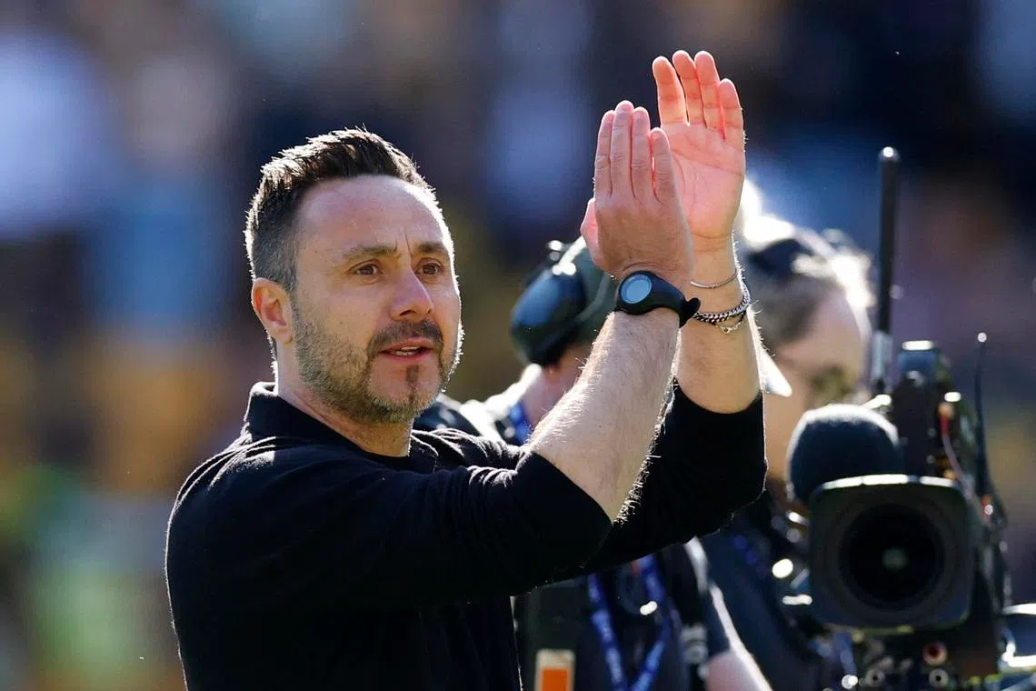 FILE PHOTO: Soccer Football - Premier League - Wolverhampton Wanderers v Tottenham Hotspur - Molineux Stadium, Wolverhampton, Britain - April 25, 2026 Tottenham Hotspur manager Roberto De Zerbi celebrates after the match Action Images via Reuters/Jason Cairnduff/File Photo