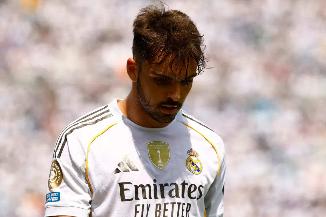 FILE PHOTO: Soccer Football - FIFA Club World Cup - Group H - Real Madrid v Pachuca - Bank of America Stadium, Charlotte, North Carolina, U.S. - June 22, 2025 Real Madrid's Raul Asencio walks off the pitch after being shown a red card REUTERS/Susana Vera/ File Photo