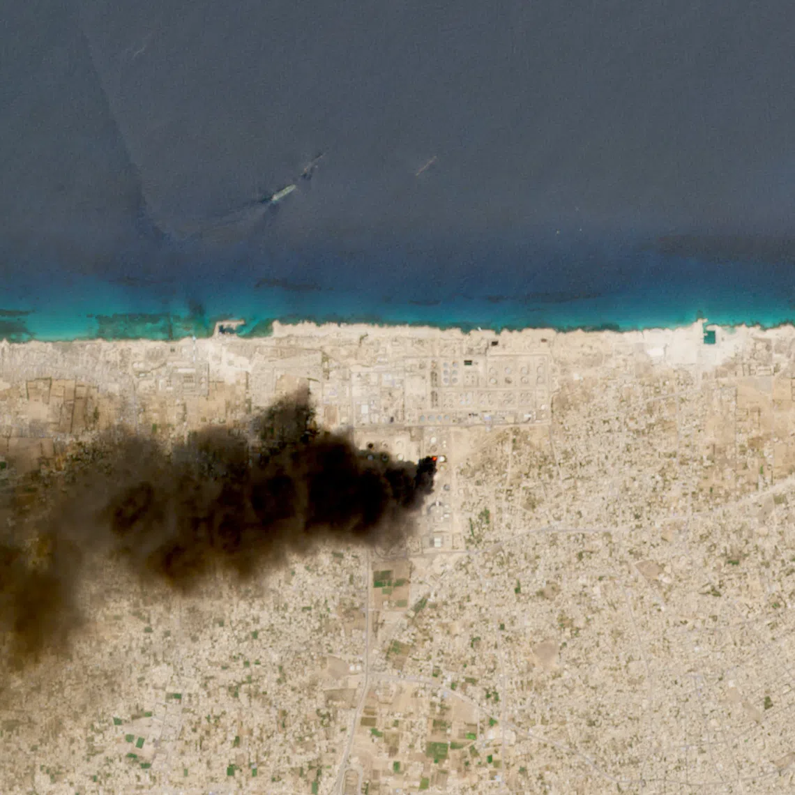 A satellite image shows smoke rising from the Zawiya oil complex following drone strikes, in Zawiya, Libya, August 11, 2026. European Union/Copernicus Sentinel-2/Handout via REUTERS