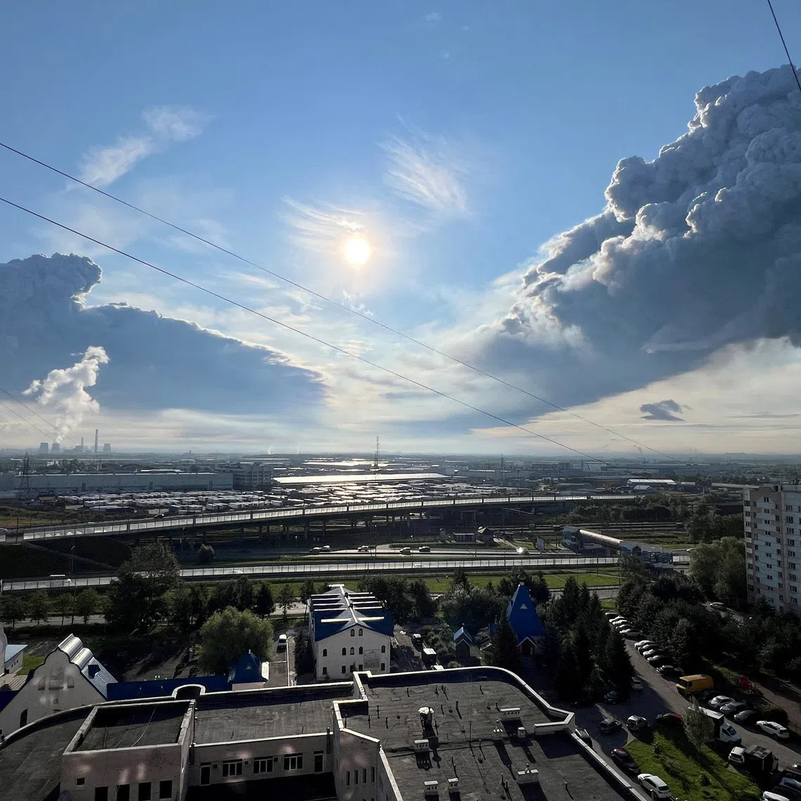 Smoke billows from the burning Wildberries warehouses following a Ukrainian drone attack, according to local authorities, in Saint Petersburg, on July 24.