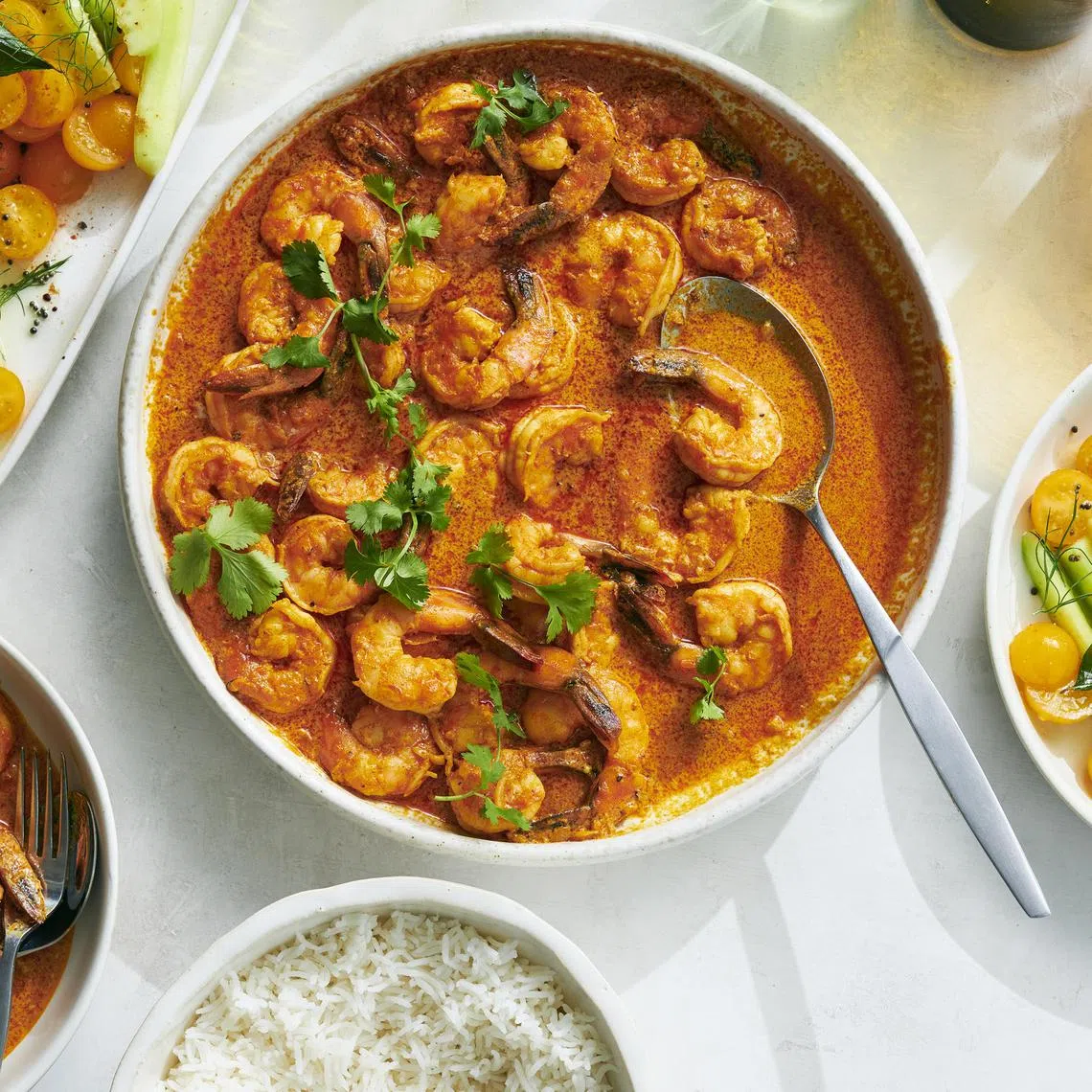 An adapted take on Madhur Jaffrey's Goan Shrimp Curry (top right). This easy-to-prepare dish is perfect for novice cooks. 