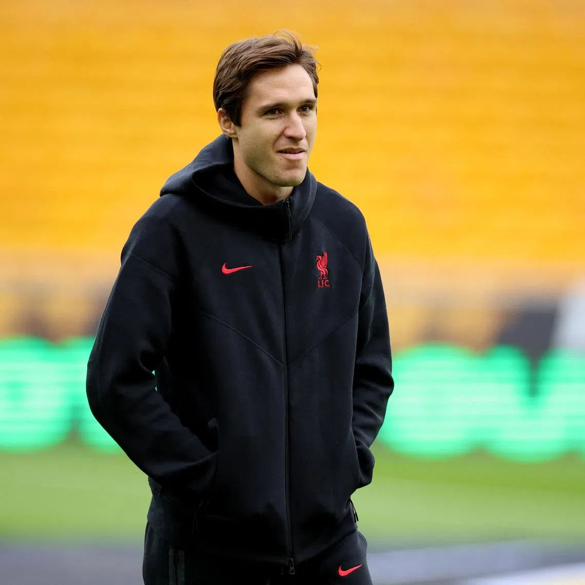 Soccer Football - Premier League - Wolverhampton Wanderers v Liverpool - Molineux Stadium, Wolverhampton, Britain - September 28, 2024 Liverpool's Federico Chiesa on the pitch before the match REUTERS/Phil Noble