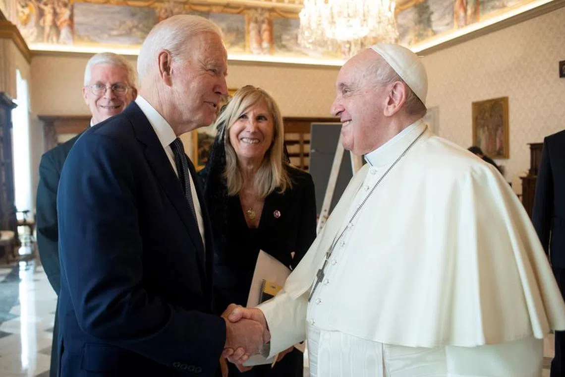 Pope Francis meets U.S. President Joe Biden at the Vatican, October 29, 2021. Vatican Media/Handout via REUTERS/ File Photo