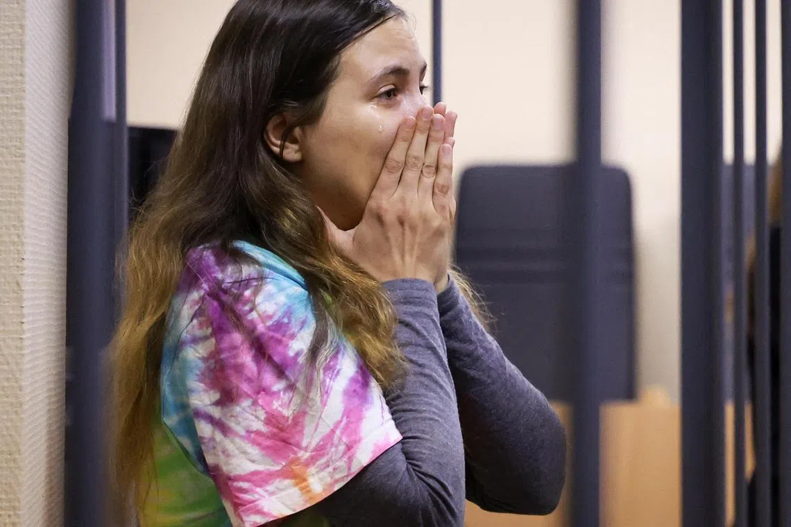 Alexandra Skochilenko reacts upon hearing the verdict at a court in Saint Petersburg.
