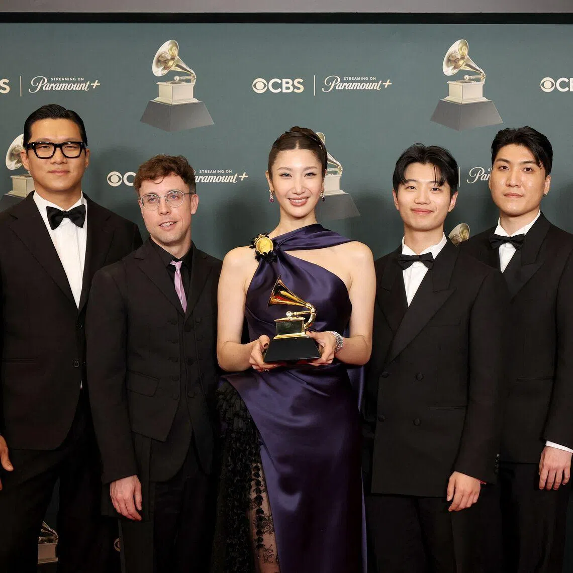 The team from animated film KPop Demon Hunters with the award for Best Song Written for Visual Media for Golden at the Grammy Awards on Feb 1.