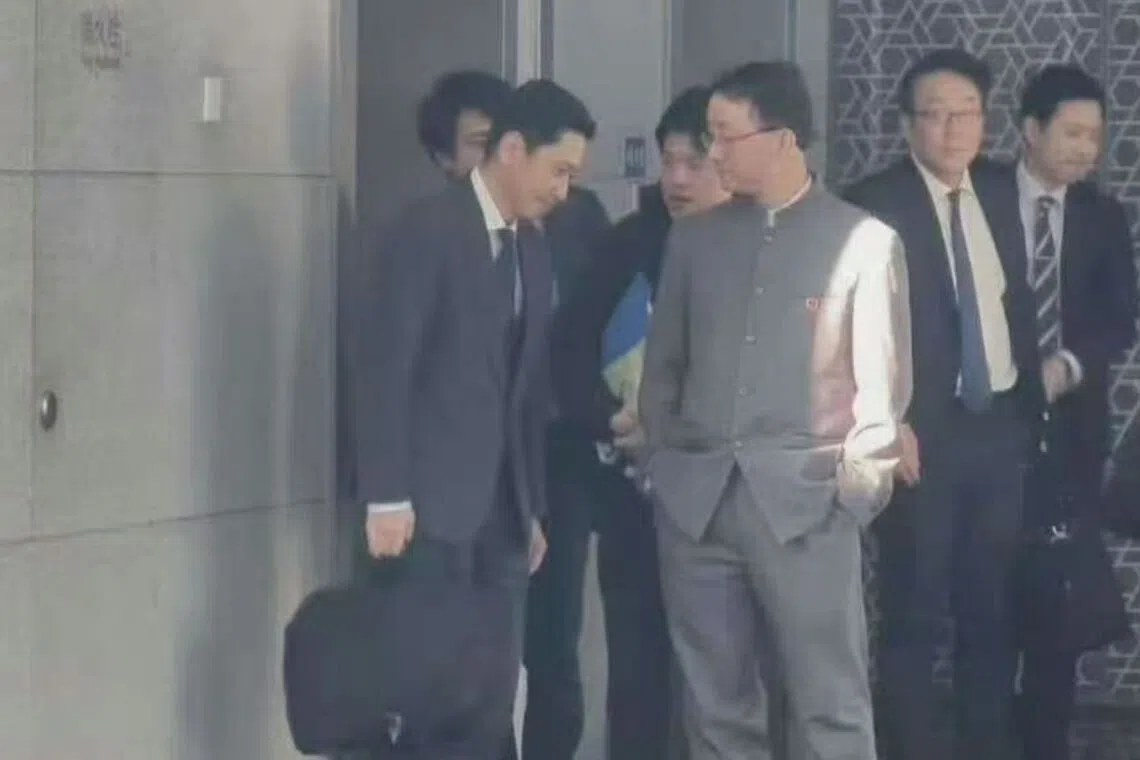 Mr Masaaki Kanai (left), head of the Japanese Foreign Ministry’s Asian and Oceanian Affairs Bureau, is pictured with his Chinese counterpart Liu Jinsong at the Chinese Foreign Ministry on Nov 11, in a widely circulated photo. 