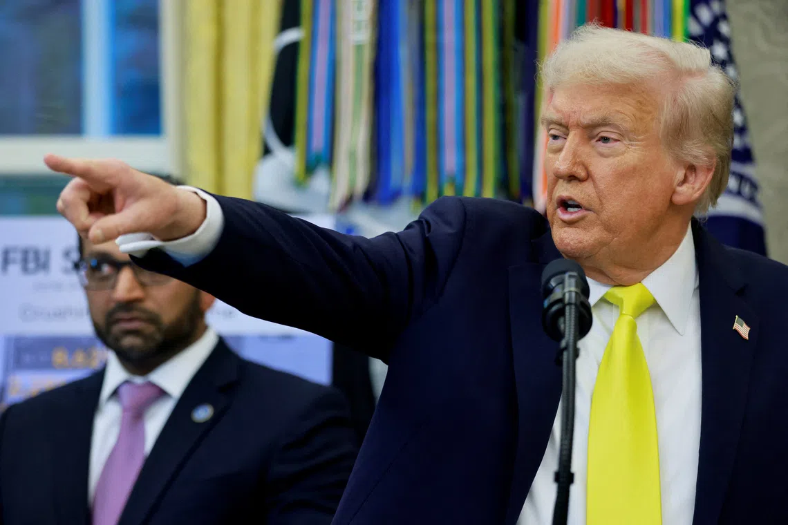 U.S. President Donald Trump points a finger as he speaks at a press conference in the Oval Office at the White House in Washington, D.C., U.S., October 15, 2025. REUTERS/Jonathan Ernst