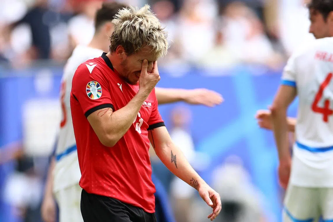 Soccer Football - Euro 2024 - Group F - Georgia v Czech Republic - Hamburg Volksparkstadion, Hamburg, Germany - June 22, 2024 Georgia's Saba Lobzhanidze looks dejected after the match REUTERS/Lisi Niesner