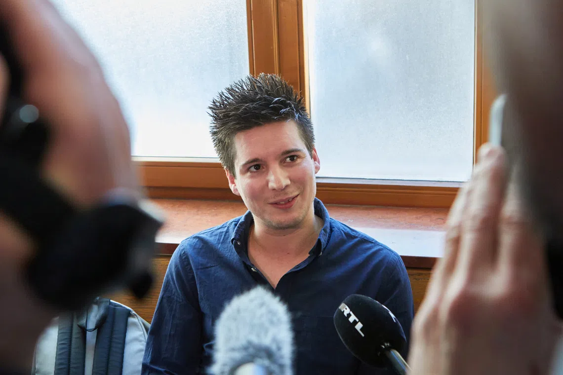 FILE PHOTO: Football Leaks whistleblower Rui Pinto talks to journalists at the Metropolitan Court in Budapest, Hungary, March 5, 2019. Picture taken March 5, 2019. Hatlaczki Balazs/Handout via REUTERS /File Photo