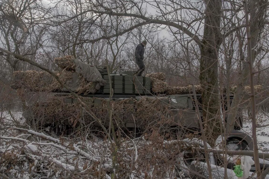 A Ukrainian soldier stands on a Leopard tank near Pokrovsk, in the eastern Donetsk region, on Dec 13.