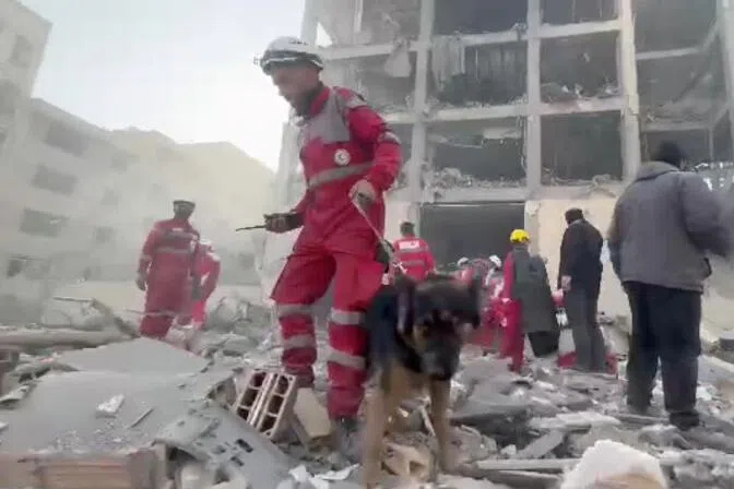 Rescuers work in the rubble of residential buildings after air strikes, in the Resalat neighbourhood, in Tehran, Iran.