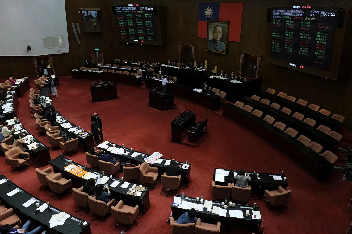 FILE PHOTO: Legislators are seen inside the Legislative Yuan in Taipei, Taiwan May 17, 2019. REUTERS/Tyrone Siu/ File Photo