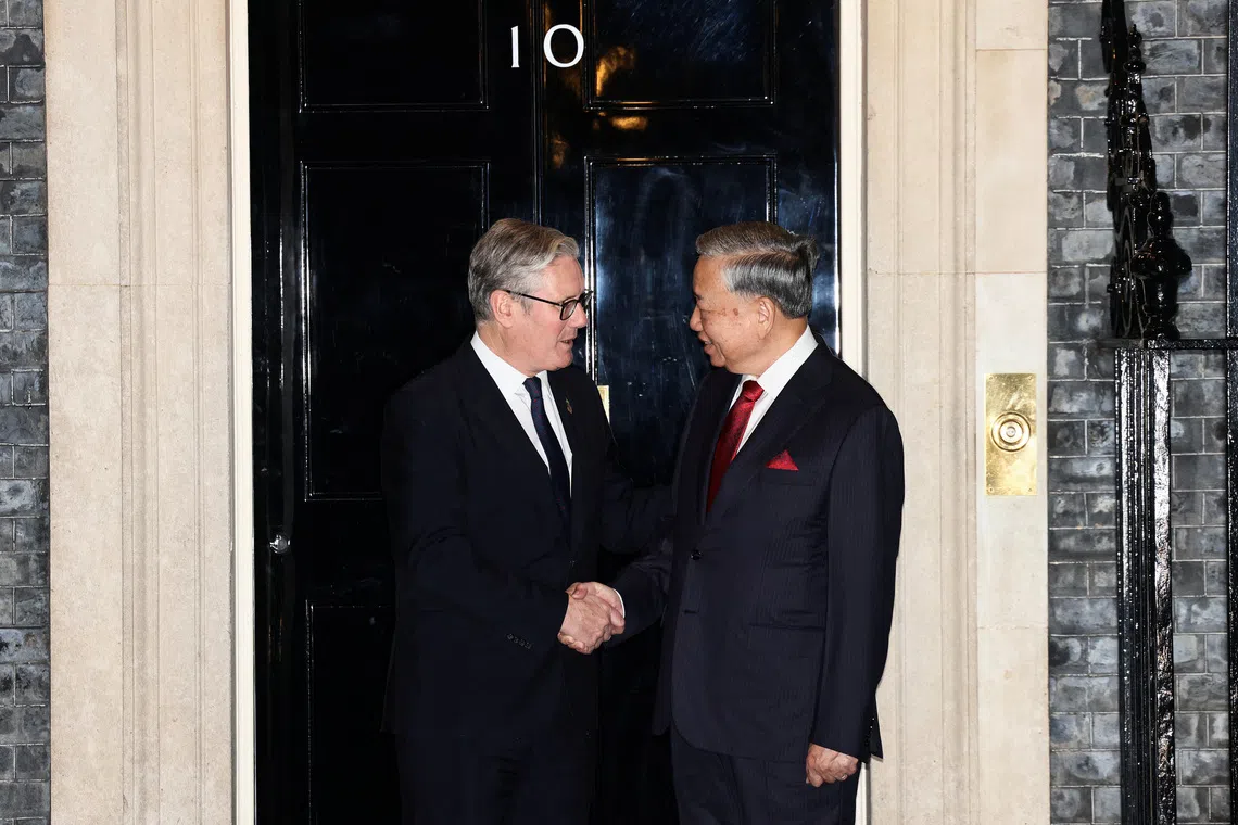 British Prime Minister Keir Starmer shakes hands with Vietnamese Communist Party chief To Lam, at Downing Street, in London, Britain, October 29, 2025. REUTERS/Jack Taylor