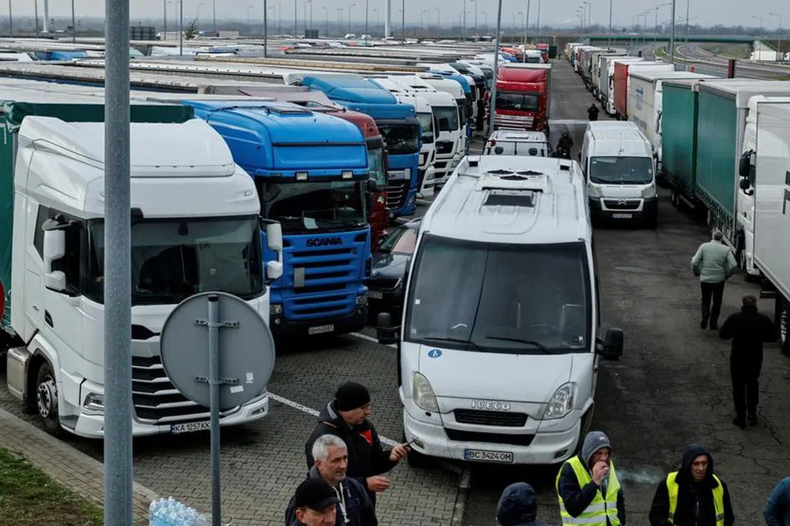 FILE PHOTO: Ukrainian trucks are parked near the Poland-Ukraine border, near the village of Korczowa, Poland November 19, 2023. REUTERS/Yan Dobronosov/File Photo