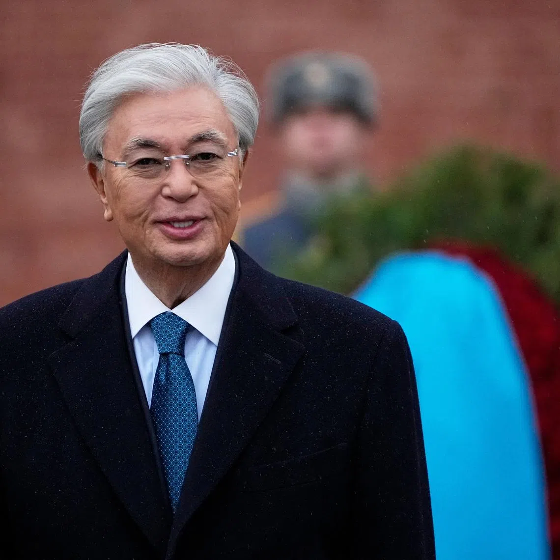 Kazakh President Kassym-Jomart Tokayev takes part in a wreath-laying ceremony at the Tomb of the Unknown Soldier by the Kremlin Wall in Moscow, Russia, November 12, 2025. Alexander Zemlianichenko/Pool via REUTERS