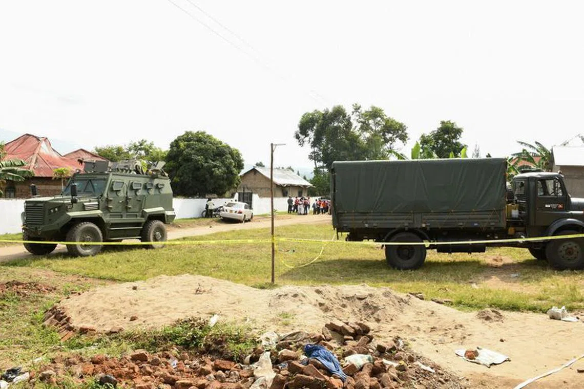 Ugandan security forces cordon the scene outside the Mpondwe Lhubirira Secondary School, after militants linked to rebel group Allied Democratic Forces (ADF) killed and abducted multiple people, in Mpondwe, western Uganda, June 17, 2023. REUTERS/Stringer/File Photo