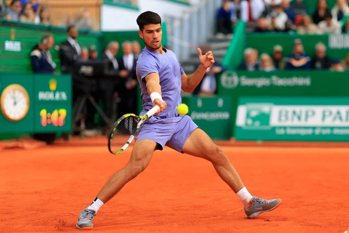 Tennis - ATP Masters 1000 - Monte Carlo Masters - Monte Carlo Country Club, Roquebrune-Cap-Martin, France - April 13, 2025 Spain's Carlos Alcaraz in action during his final match against Italy's Lorenzo Musetti REUTERS/Manon Cruz/File Photo