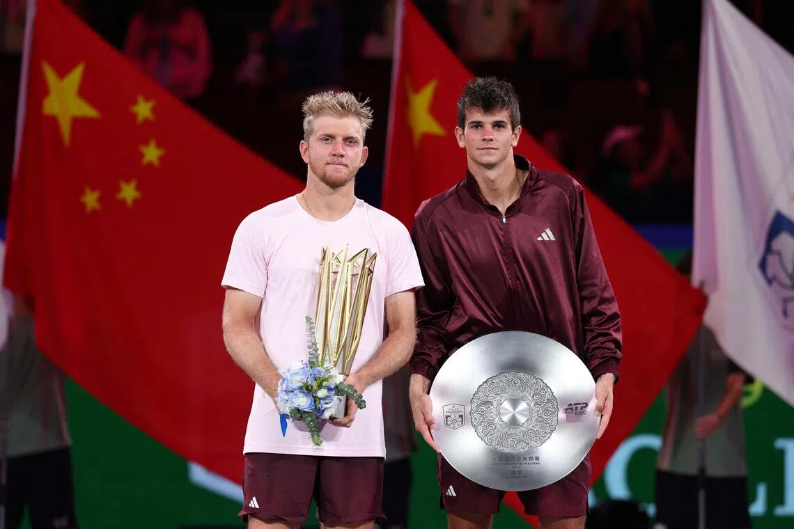 Alejandro Davidovich Fokina (left) celebrates with the winner’s trophy after beating his Spanish compatriot Rafael Jodar in the ATP Shanghai Masters final on Oct 18.