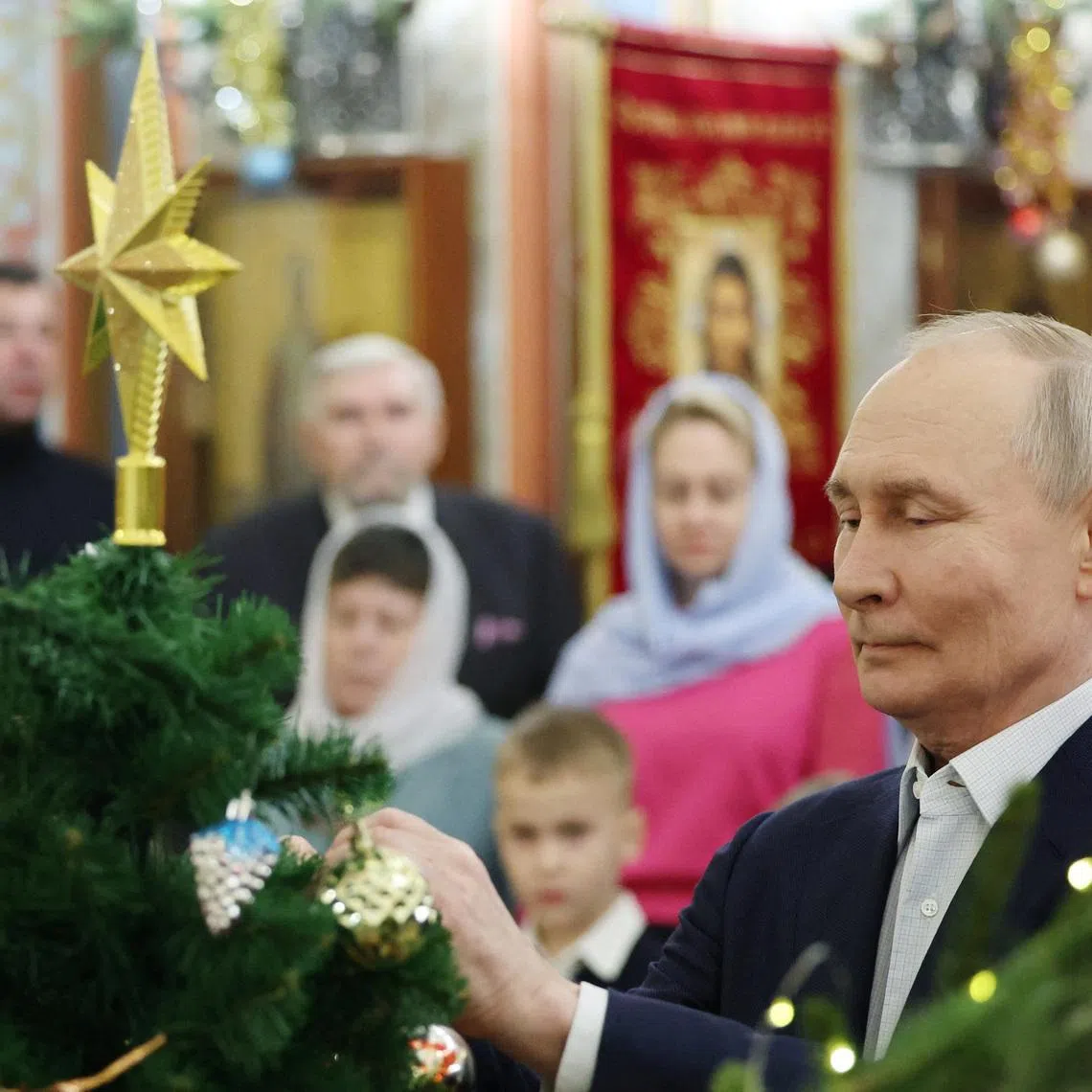 Russia's President Vladimir Putin attends the Orthodox Christmas liturgy at a church in the Moscow region, Russia, January 7, 2026. Sputnik/Vyacheslav Prokofyev/Pool via REUTERS