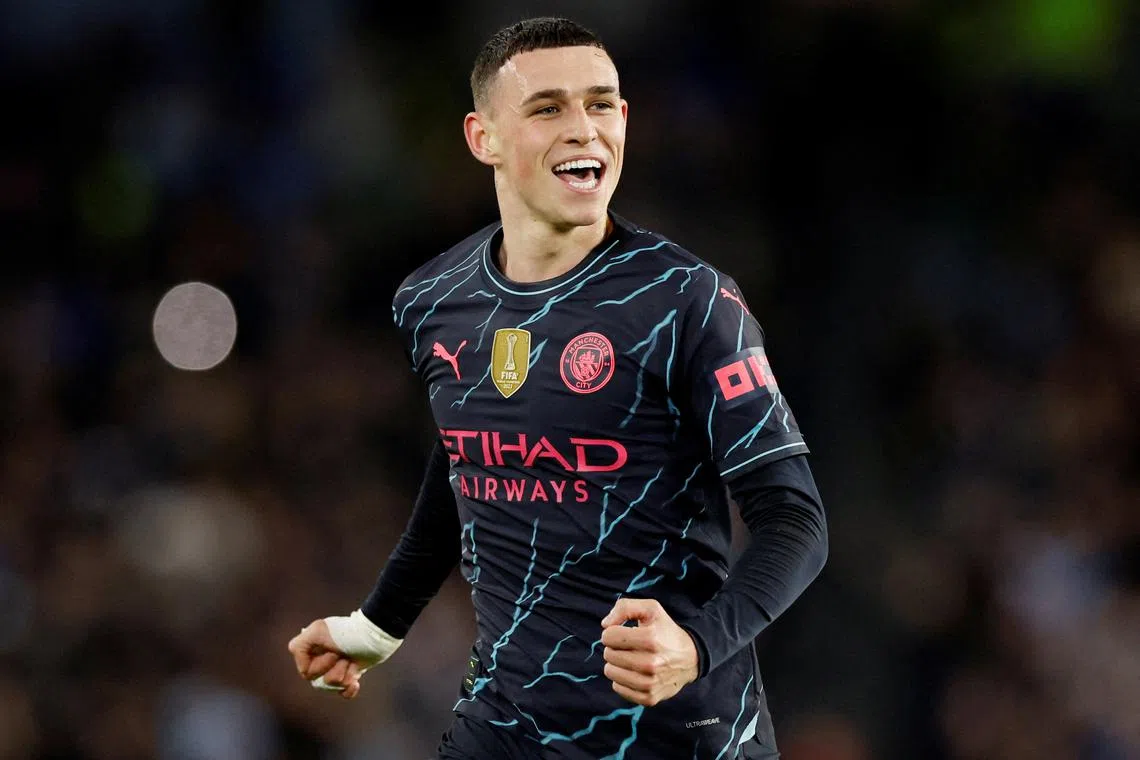 Soccer Football - Premier League - Brighton & Hove Albion v Manchester City - The American Express Community Stadium, Brighton, Britain - April 25, 2024 Manchester City's Phil Foden celebrates scoring their second goal Action Images via Reuters/Peter Cziborra