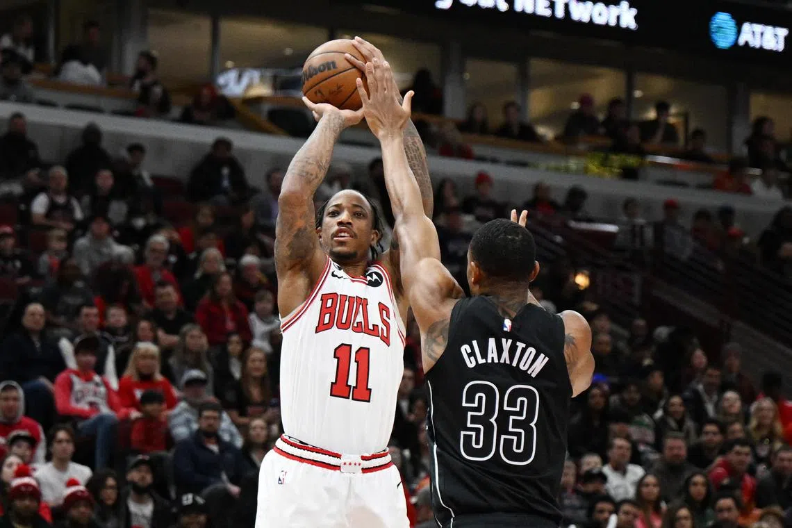 Chicago Bulls forward DeMar DeRozan shooting in the first half against Brooklyn Nets centre Nic Claxton at United Centre. The Bulls ended the Nets' 12-game winning streak with a 121-112 triumph.