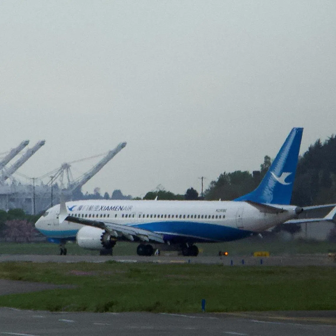 FILE PHOTO: A Boeing 737 MAX plane, intended for China's Xiamen Airlines, arrives at King County International Airport after returning from China due to ongoing tariff disputes, in Seattle, Washington, U.S. April 19, 2025. REUTERS/Dan Catchpole/File Photo