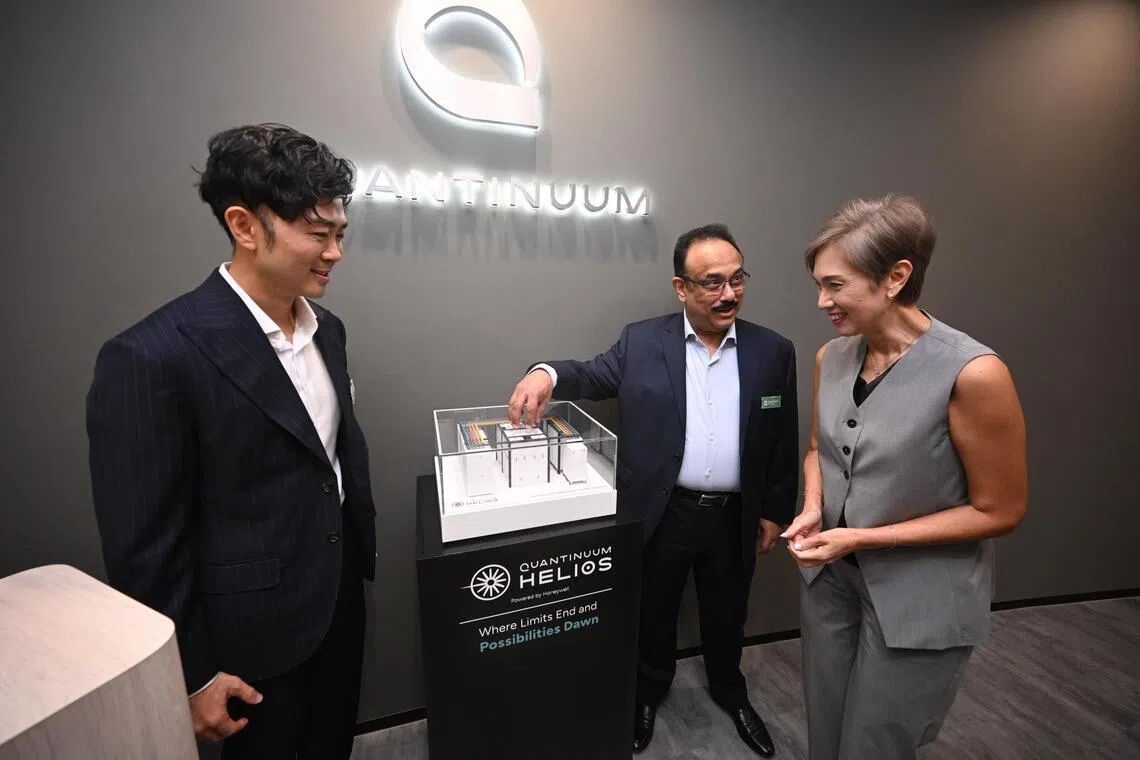 (From left) Dr Marvin Lee, Singapore country leader of Quantinuum, Dr Rajeeb Hazra, president and chief executive officer of Quantinuum, and Ms Josephine Teo, Minister for Digital Development and Information of Singapore, at the Quantinuum Singapore R&D and operations centre launch on March 11. 