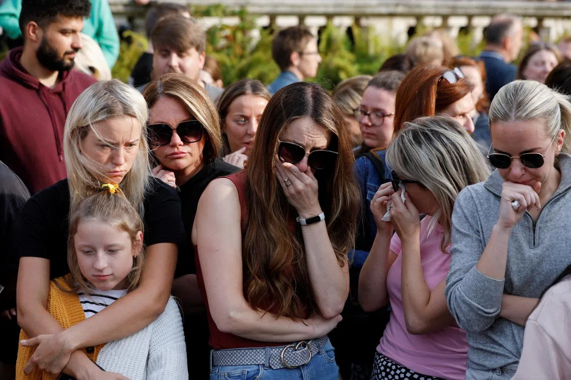 People attend a vigil for the victims of the knife attack in Southport, Britain, July 30, 2024. REUTERS/Temilade Adelaja