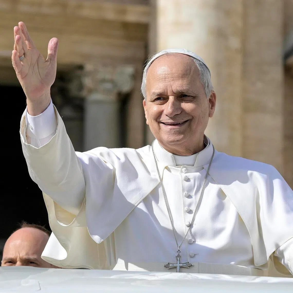 Pope Leo XIV waving to the faithful on Feb 18, during the weekly general audience in Saint Peter's Square, in the Vatican City.
