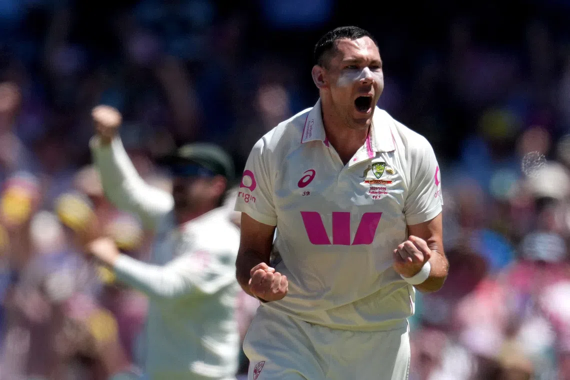 Cricket - The Ashes - Australia v England - Fifth Test - Sydney Cricket Ground, Sydney, Australia - January 7, 2026 Australia's Scott Boland celebrates after taking the LBW wicket of England's Joe Root REUTERS/Asanka Brendon Ratnayake