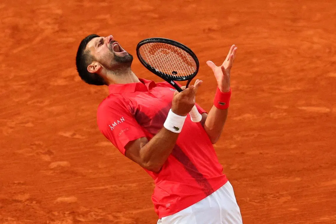 Tennis - French Open - Roland Garros, Paris, France - June 6, 2025 Serbia's Novak Djokovic reacts during his semi final match against Italy's Jannik Sinner REUTERS/Denis Balibouse