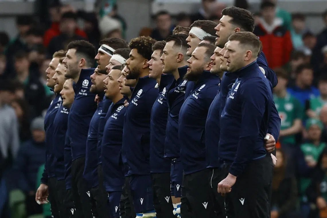 FILE PHOTO: Rugby Union - Six Nations Championship - Ireland v Scotland - Aviva Stadium, Dublin, Ireland - March 16, 2024 Scotland players lined up during their national anthem before the match REUTERS/Clodagh Kilcoyne/File Photo