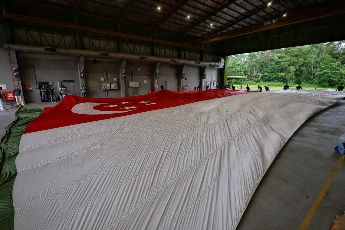 A state flag, measuring 30m by 20m, displayed at Sembawang Airbase on June 22.