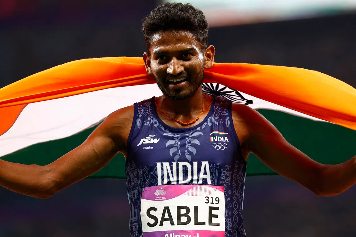 India’s Avinash Sable celebrates after winning the men’s 5,000m Final at the Hangzhou Asian Games in 2023.