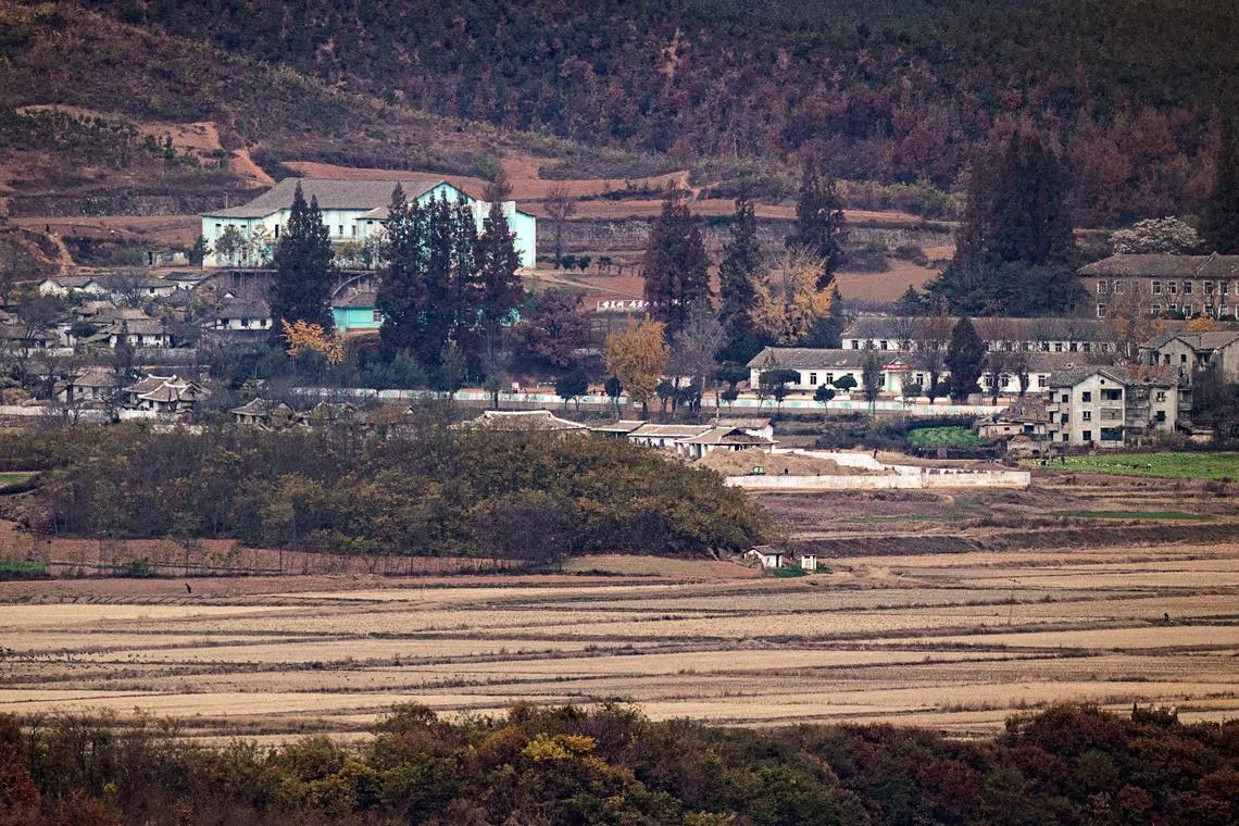 North Korea's propaganda village Kaepoong is seen in this picture taken from the Unification Observation Platform, near the demilitarized zone on Nov 3, 2022. Debate is brewing in South Korea over efforts to scrap a decades-old ban on North Korean media.
